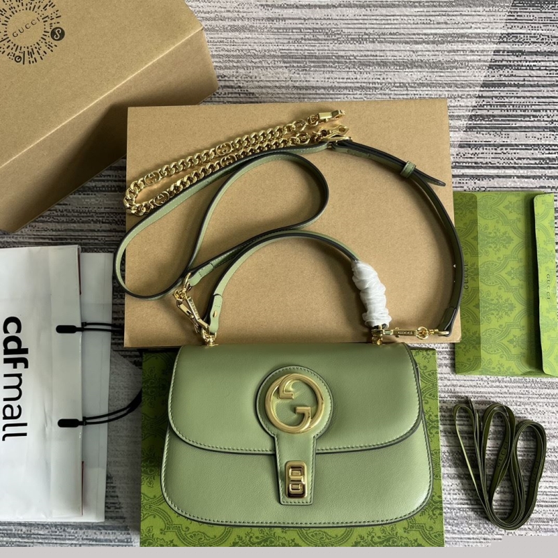 G*u*i top handle bags